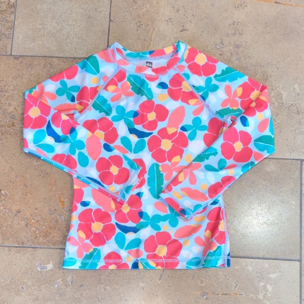 Tea Collection girl long sleeve rash guard. Blue and red floral. Size 8.